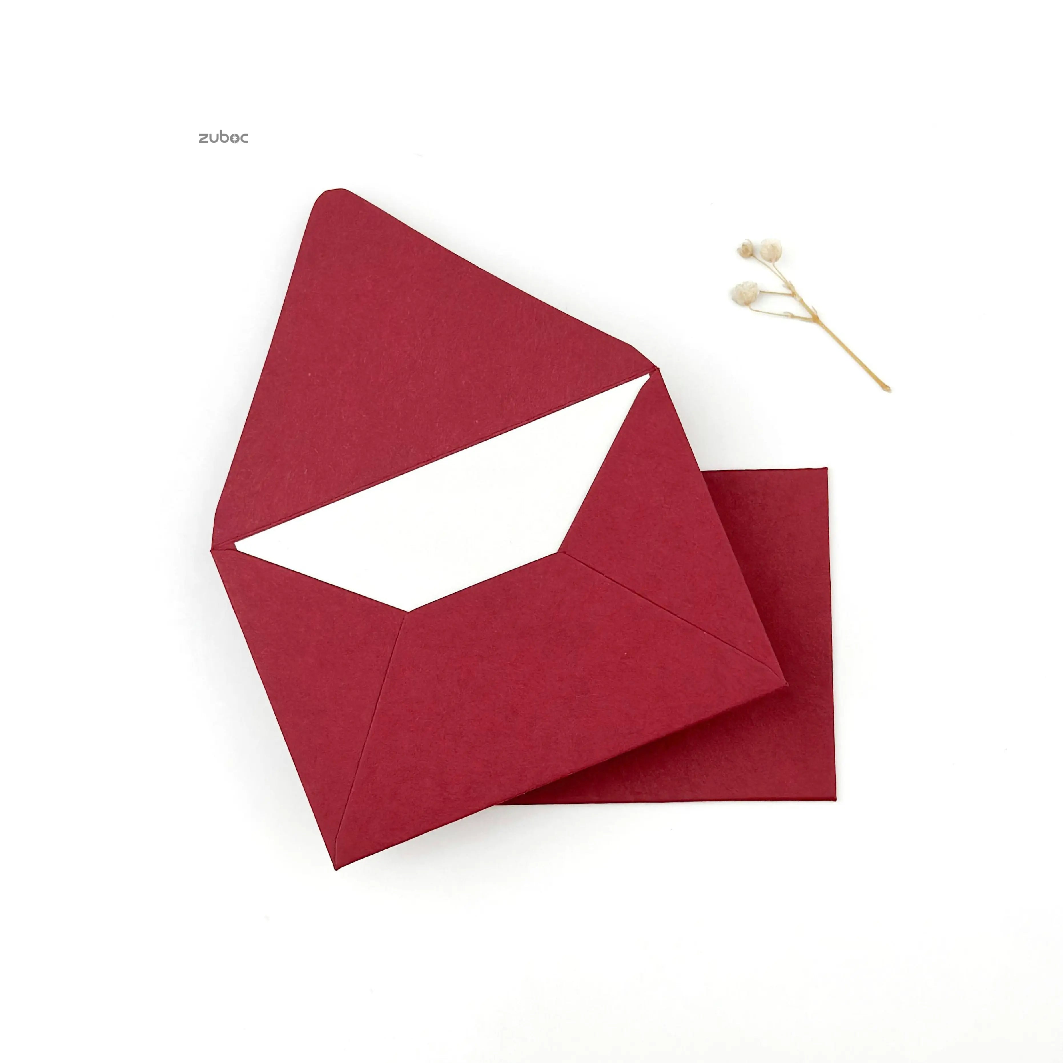 Deep red counter flap envelope C6 top-down view for party crafts