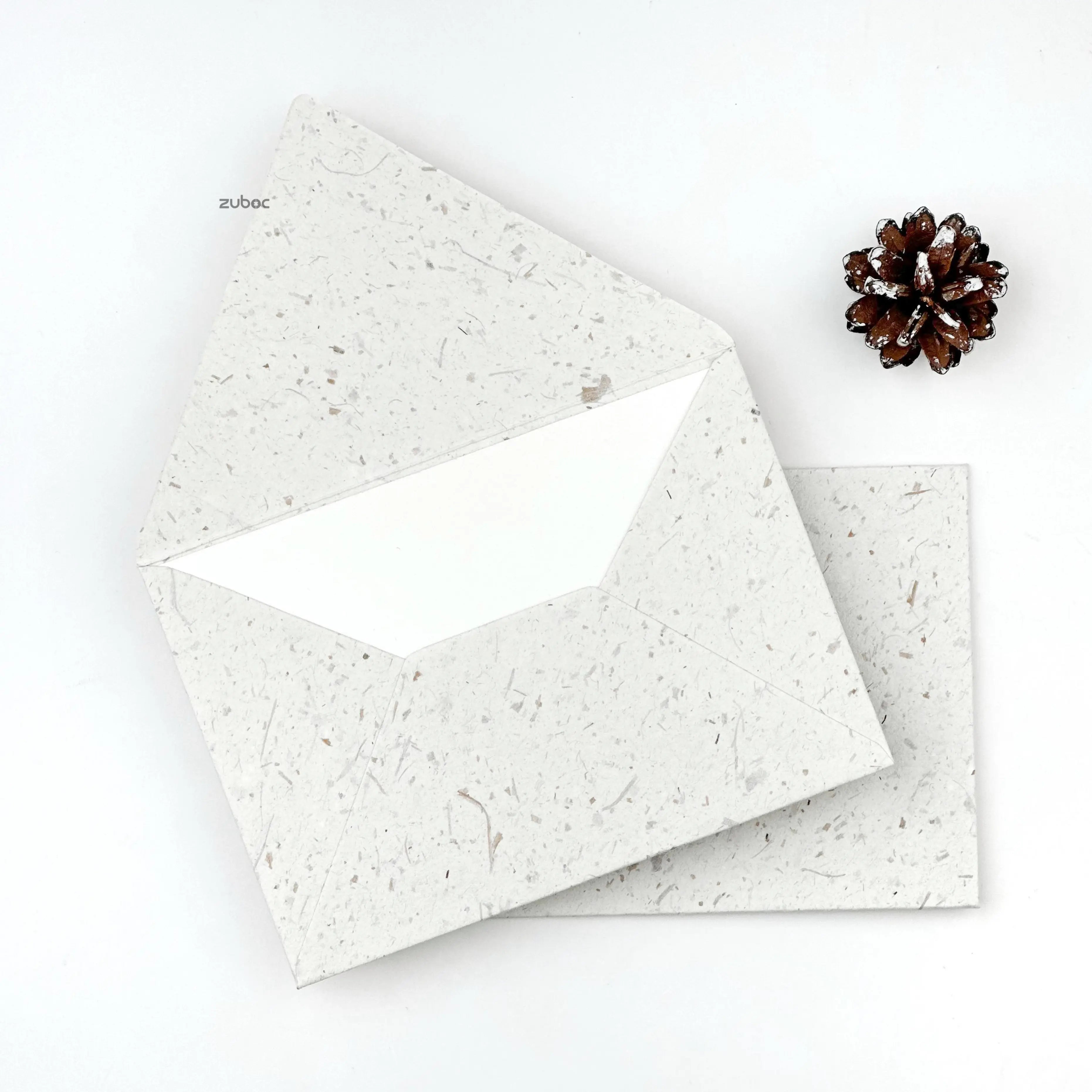 Light off-white C6 envelope top-down view for wedding crafts