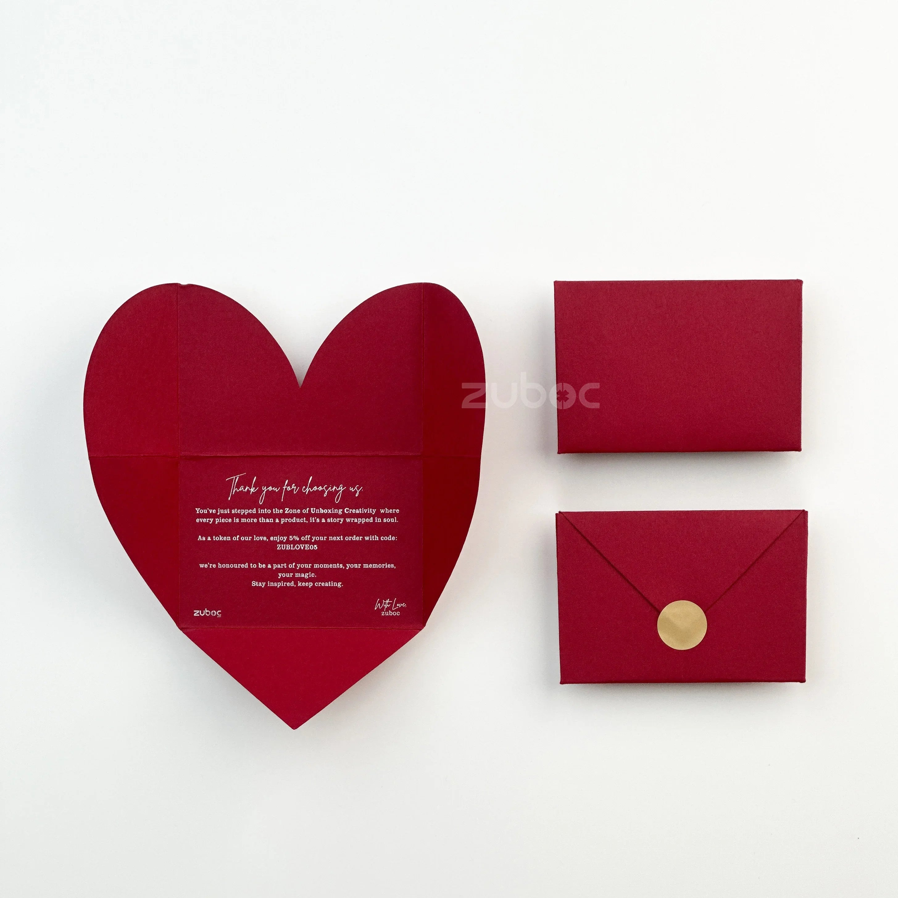 Premium heartfold envelopes in maroon and navy blue with screen-printed message ? ideal for corporate gifting and branding by Zuboc.