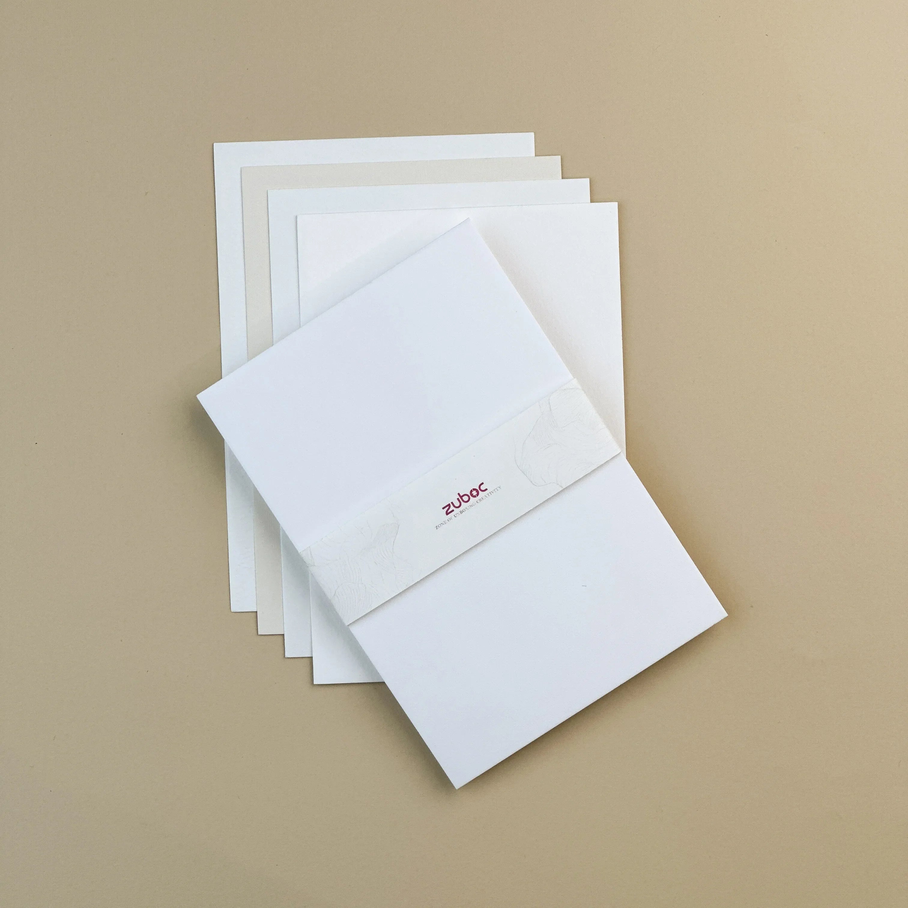 "Set of 19?13 cm premium textured cards in vanilla white, cotton watercolour, watercolour textured, and needle point finishes ? ideal for invitations, greeting cards, and luxury stationery."-1 
