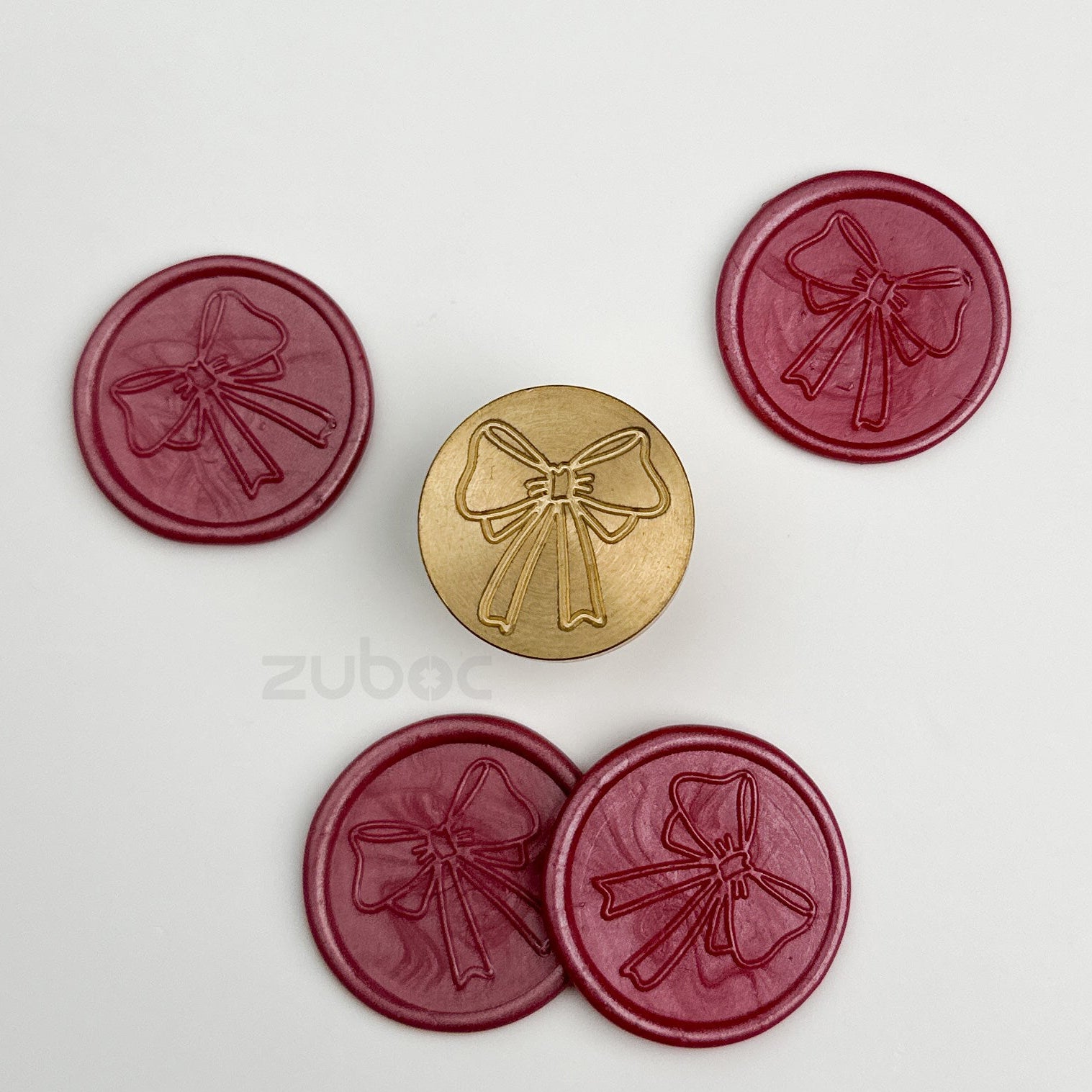 Brown wax stamp with wooden handle for handmade cards