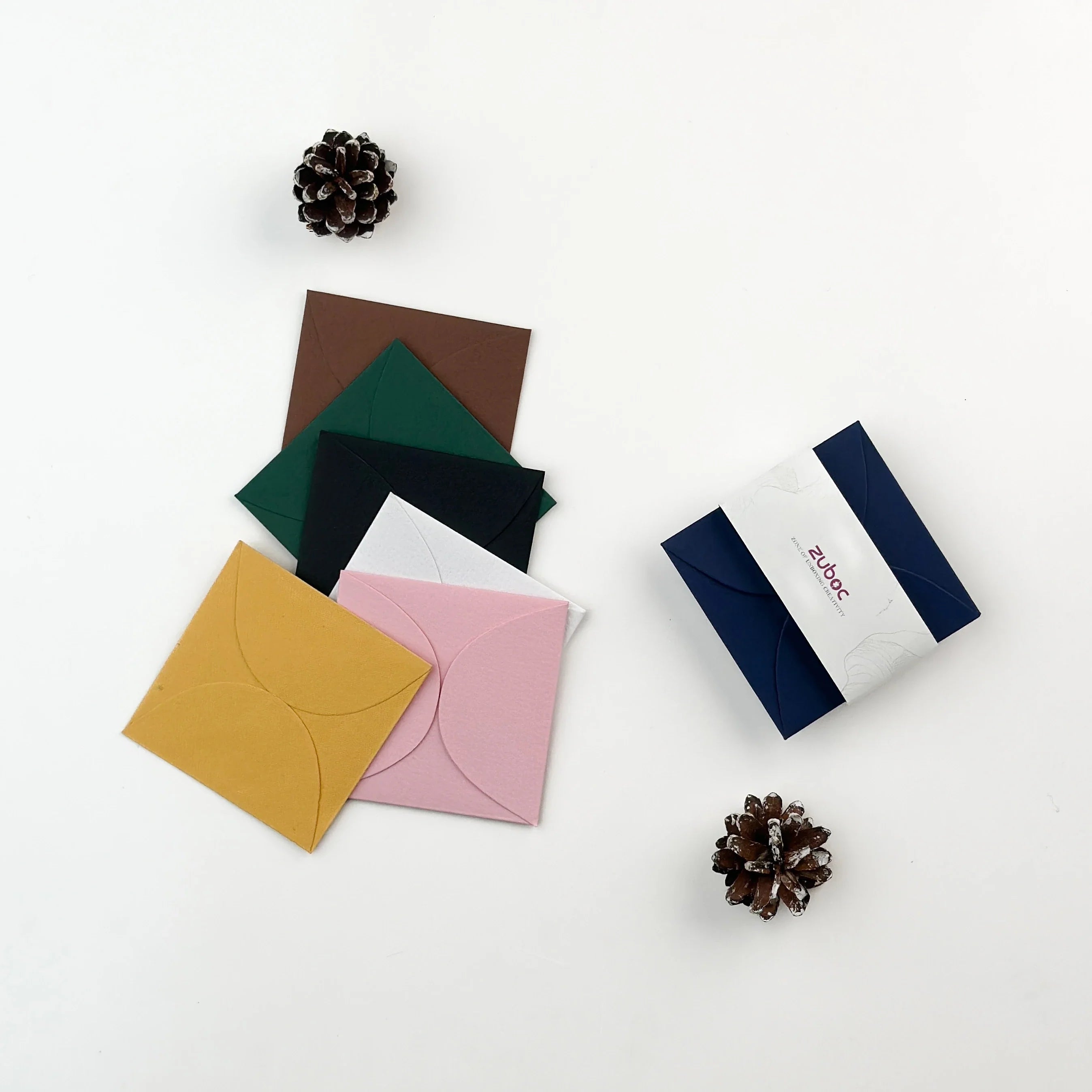 Shade of Whimsy mini semi-circle envelopes set of 7 in plain navy blue, chocolate brown, baby pink, forest green, black, normal white, and mango yellow from Zuboc ? premium imported and handmade papers for gifting, tags, and creative stationery-1
