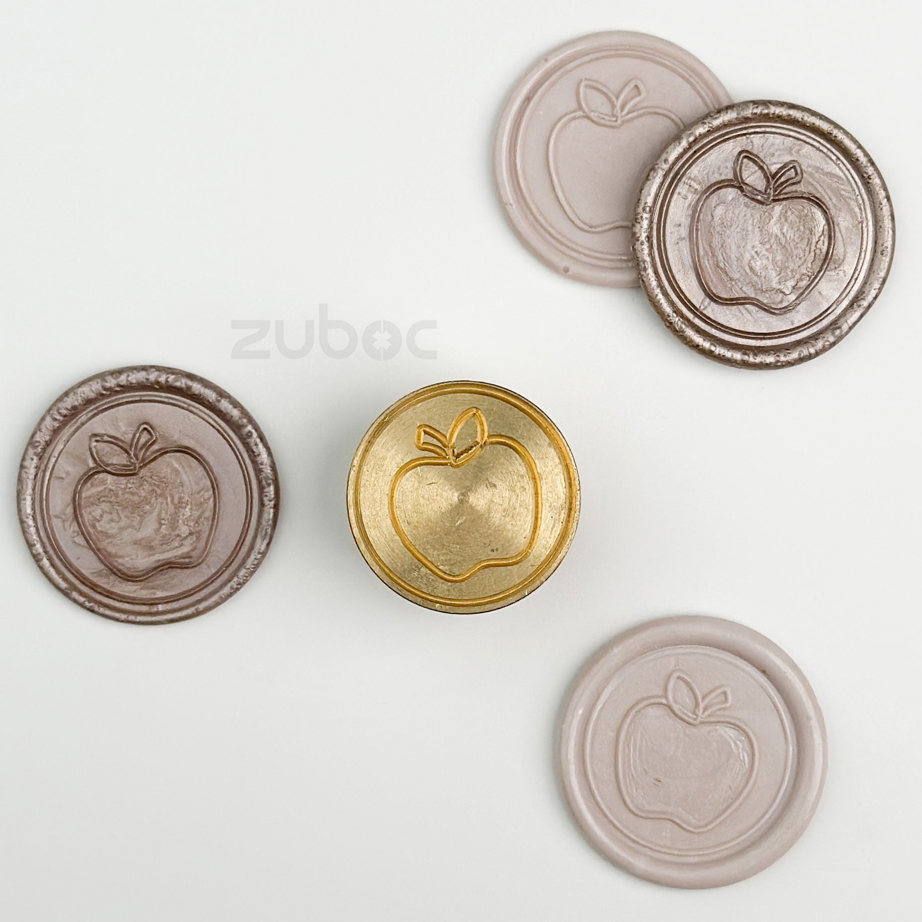 Gold wax stamp top-down view for handmade cards