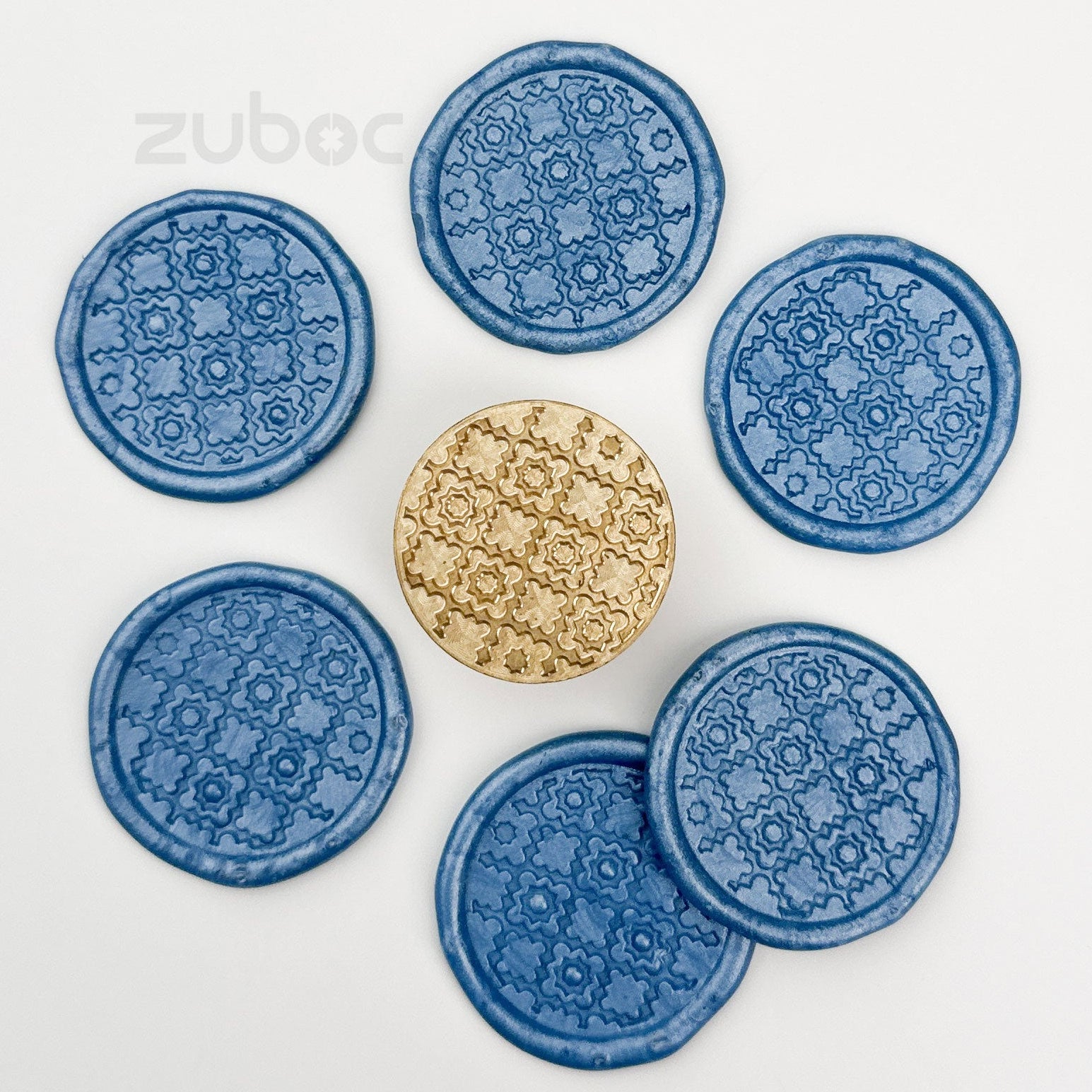 Blue and gold wax stamp top-down view for handmade cards