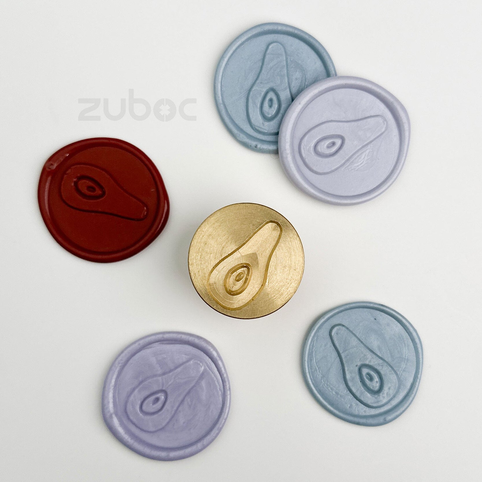 Gold wax stamp top-down view for handmade cards