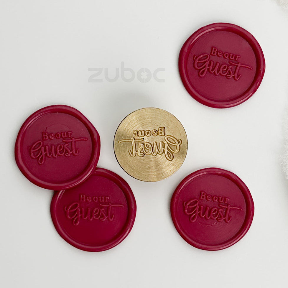 Burgundy wax stamp top-down view for handmade cards