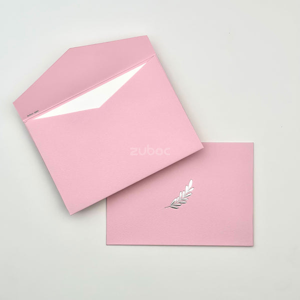 Soft pink booklet envelope top-down view for art projects