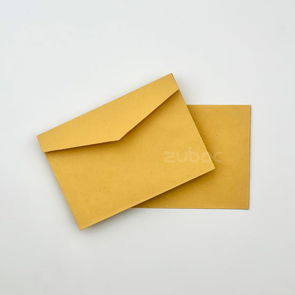 Mustard yellow booklet envelope top-down view for creative hobbies