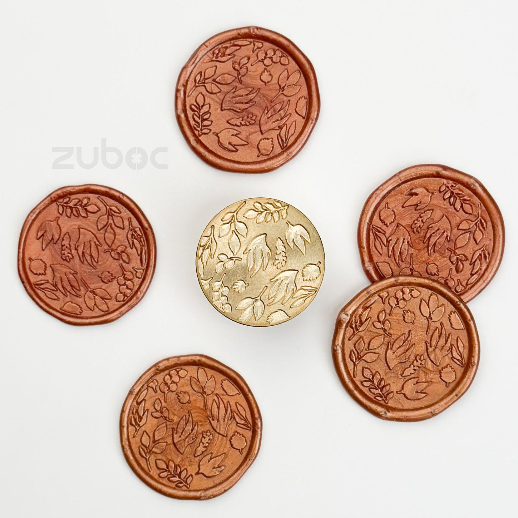 Warm copper wax stamp top-down view for handmade cards