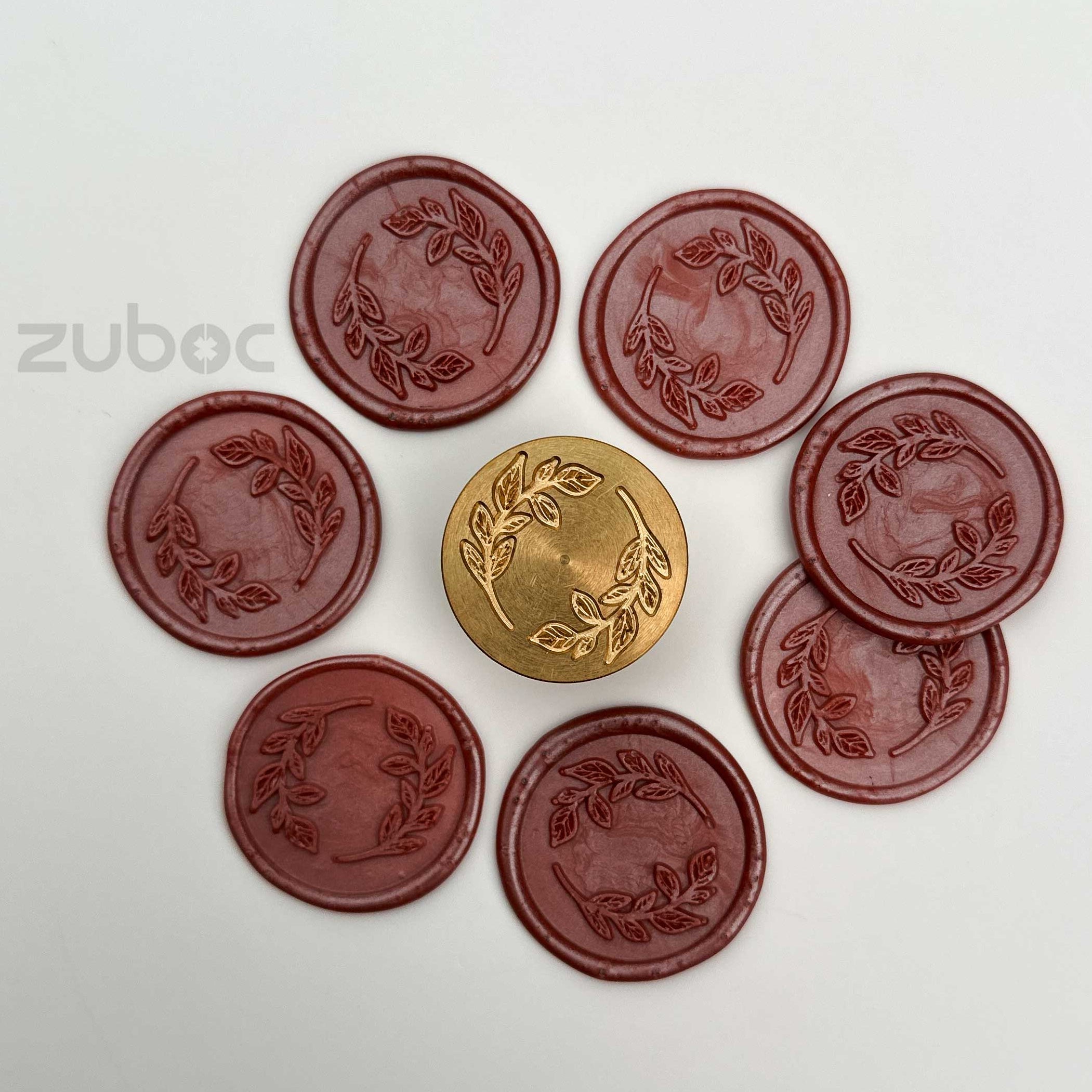 Red and gold wax stamp top-down view for handmade cards