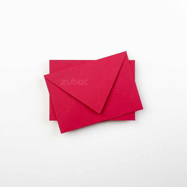 Bright red envelope C6 top-down view for wedding invitations