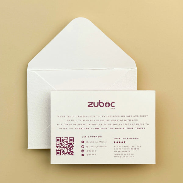 White thank you card and envelope top-down view for DIY projects