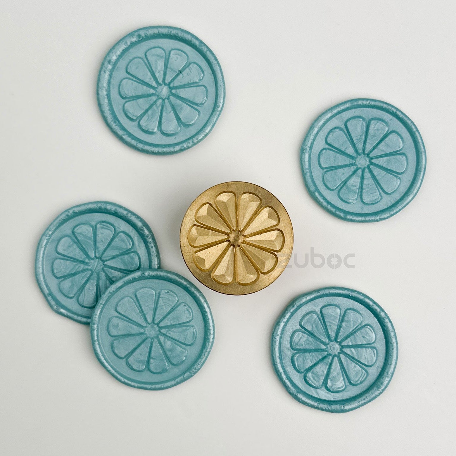 Orange wax stamp with wooden handle for handmade cards