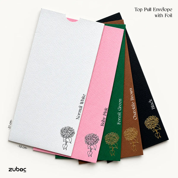 Five textured top pull envelopes with metallic foil, fanned out on a light background. The envelope available colors are Normal White, Baby Pink, Forest Green, and Chocolate Brown and Black.