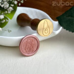 Avocado wax seal stamp with smooth wooden handle