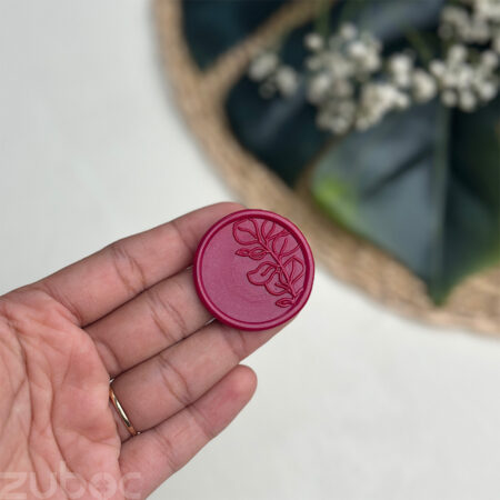 Wax seal in magenta foliage design, perfect for elegant presentations and crafts-1