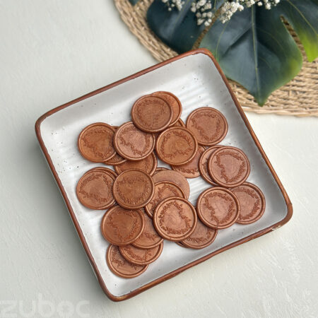 Wax seal in bronze gold heart wreath design, creating an ideal look for envelopes