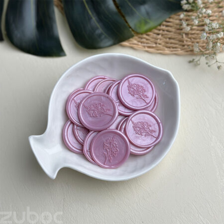 Wax seal in lilac lily design, perfect for elegant envelopes