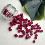 Beautiful ceiling Magenta Wax Beads that are a great creative project.