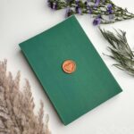 Invitation envelope forest green and bronze gold heart wreath wax seal