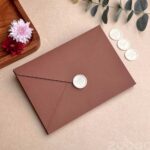 Chocolate brown envelope and pearl white thankyou wax seal