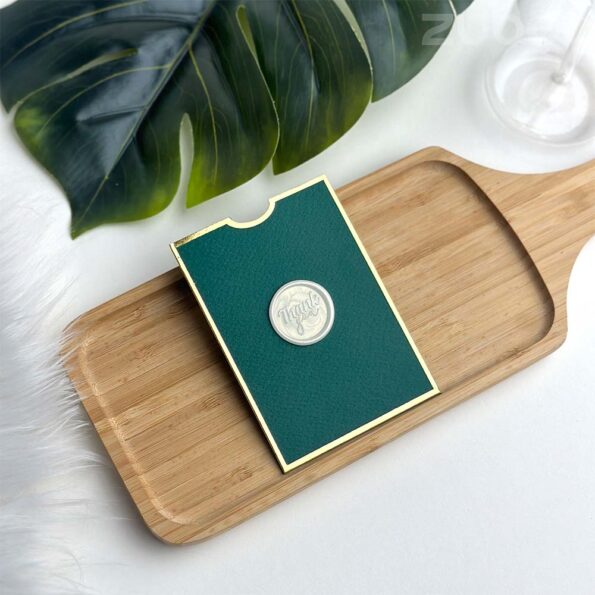 Forest green top tag envelope with pearl white thank you wax seal