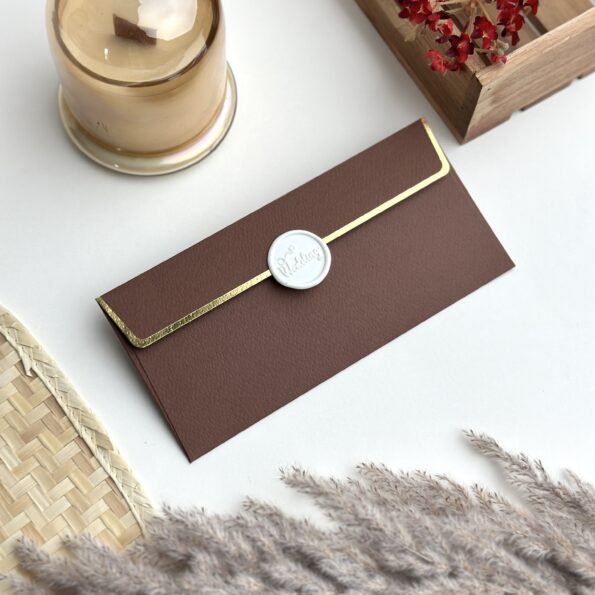 Chocolate brown money envelope with snow white wedding wax seal