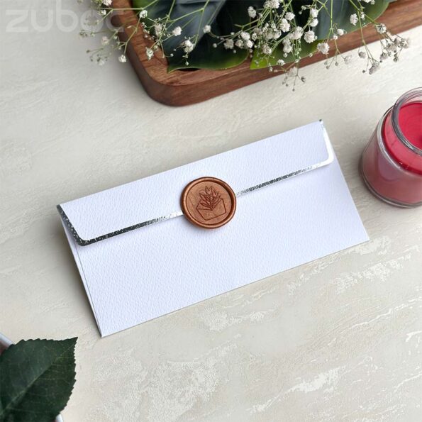 Normal white foiled money envelope with bronze gold envelope wax seal