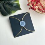 Semi circle foiled black envelope and cloudy sky cherry blossom wax seal