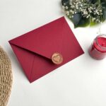 Counter flap maroon envelope with heart wreath bronze gold wax seal