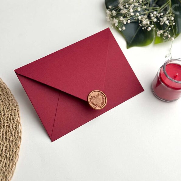 Counter flap maroon envelope with heart wreath bronze gold wax seal