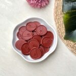 Avacado wax seal-2 in a brown color on an envelope