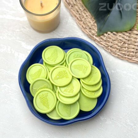 Wax seal in lime green grape design, perfect for crafts, envelopes, and gifts