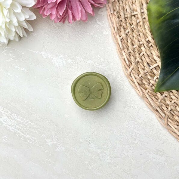 Wax seal in olive green hair bow design, perfect for a beautiful ideal envelope-2