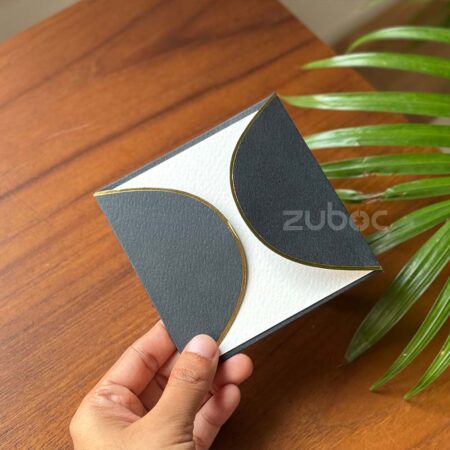 white note card and black gold foil semicircle