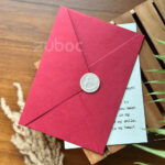 STD maroon A5 envelopes with textured insert card and wax seal set