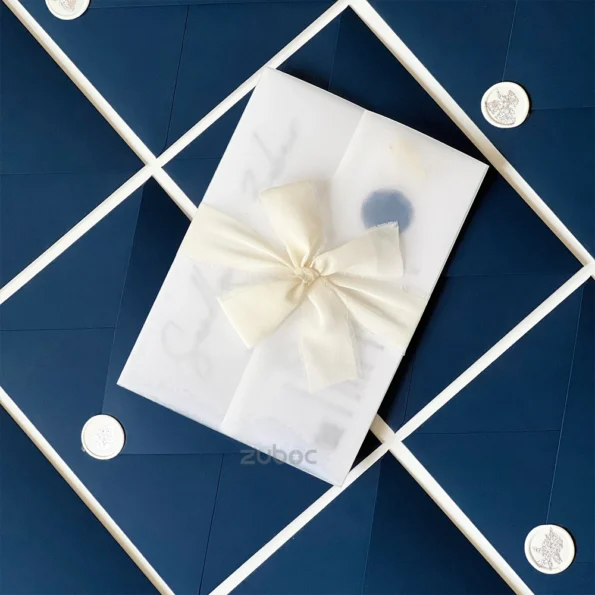 Navy blue invitation set with vellum, ribbon, wax seals, and dry flower, for elegent look foe invitations